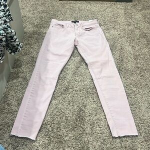 Light pink colored skinny jeans